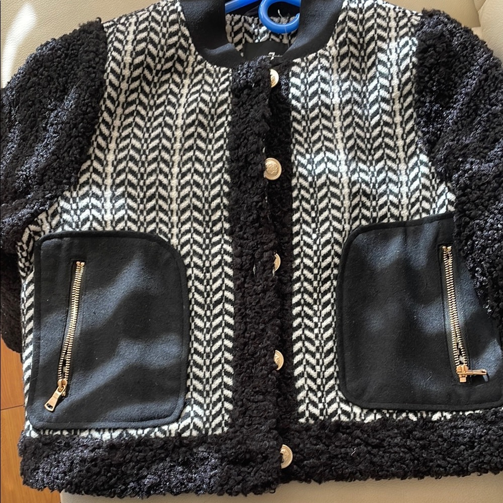 Stylish Black and White womens jacket from 7 for all
Mankind. New
